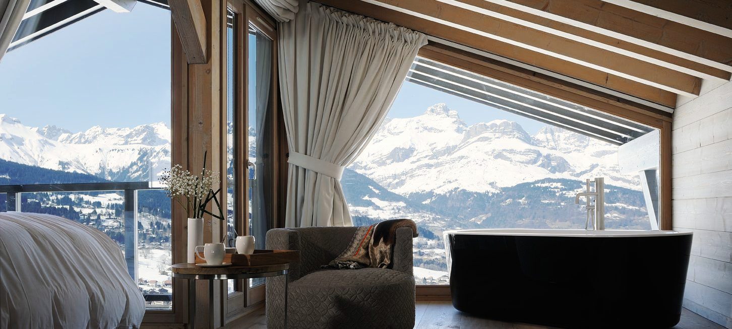 Chambre de chalet avec vue sur les sommets